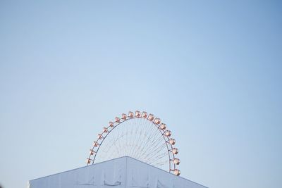 Low angle view of built structure against clear blue sky