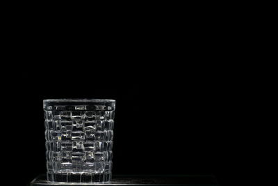 Close-up of glass against black background
