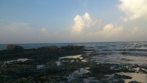 Scenic view of beach against sky