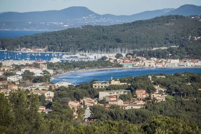 High angle view of townscape and mountains