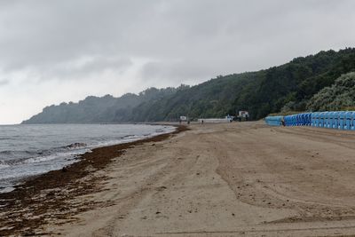 Scenic view of beach against sky