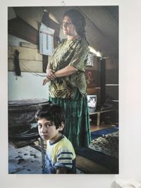 Portrait of boy standing on floor