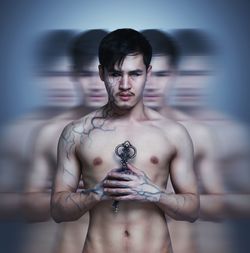 Multiple image of shirtless man holding key