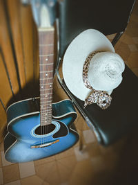 High angle view of guitar on table