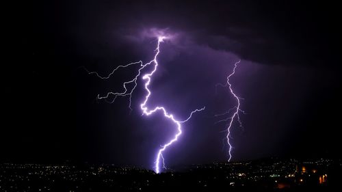 Lightning in sky at night