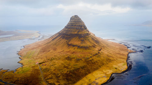 Panoramic view of volcanic landscape against sky