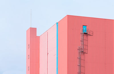 Red building against sky