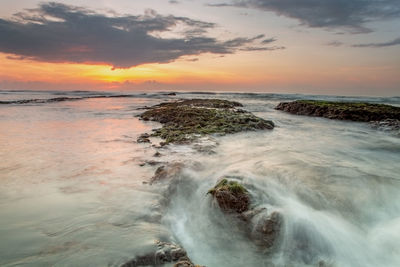 Scenic view of sea against sky during sunset