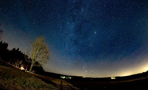 Scenic view of star field against sky at night