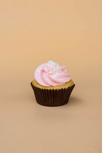 Close-up of cupcake against white background