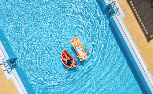 High angle view of people in swimming pool