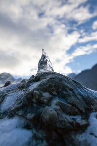 Scenic view of snowcapped mountain against sky