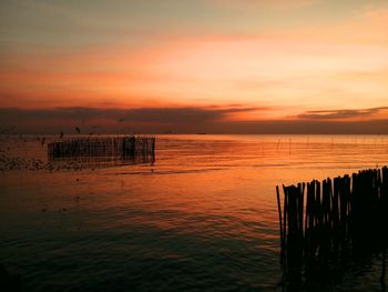 Scenic view of sea against sky during sunset