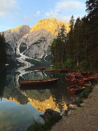 Scenic view of boats moored at lake