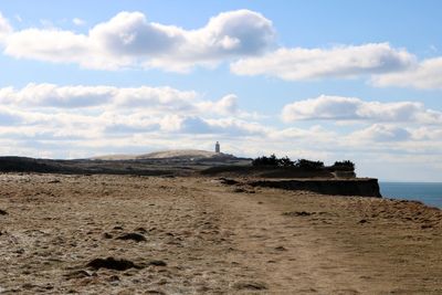 Scenic view of beach against sky