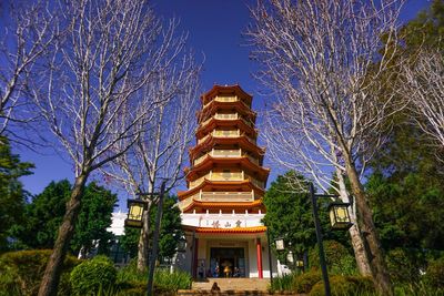 Low angle view of building against blue sky