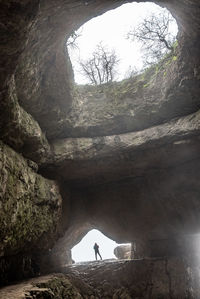 Man standing on rock formation