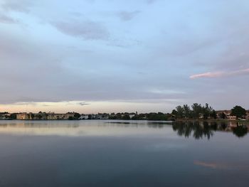 Scenic view of lake against sky during sunset