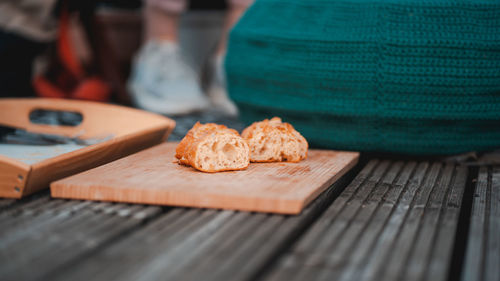 Close-up of hand on cutting board