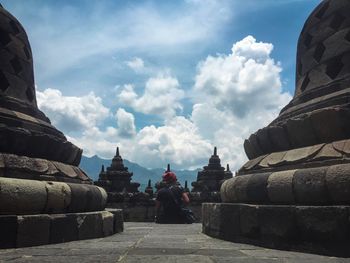 View of temple against cloudy sky