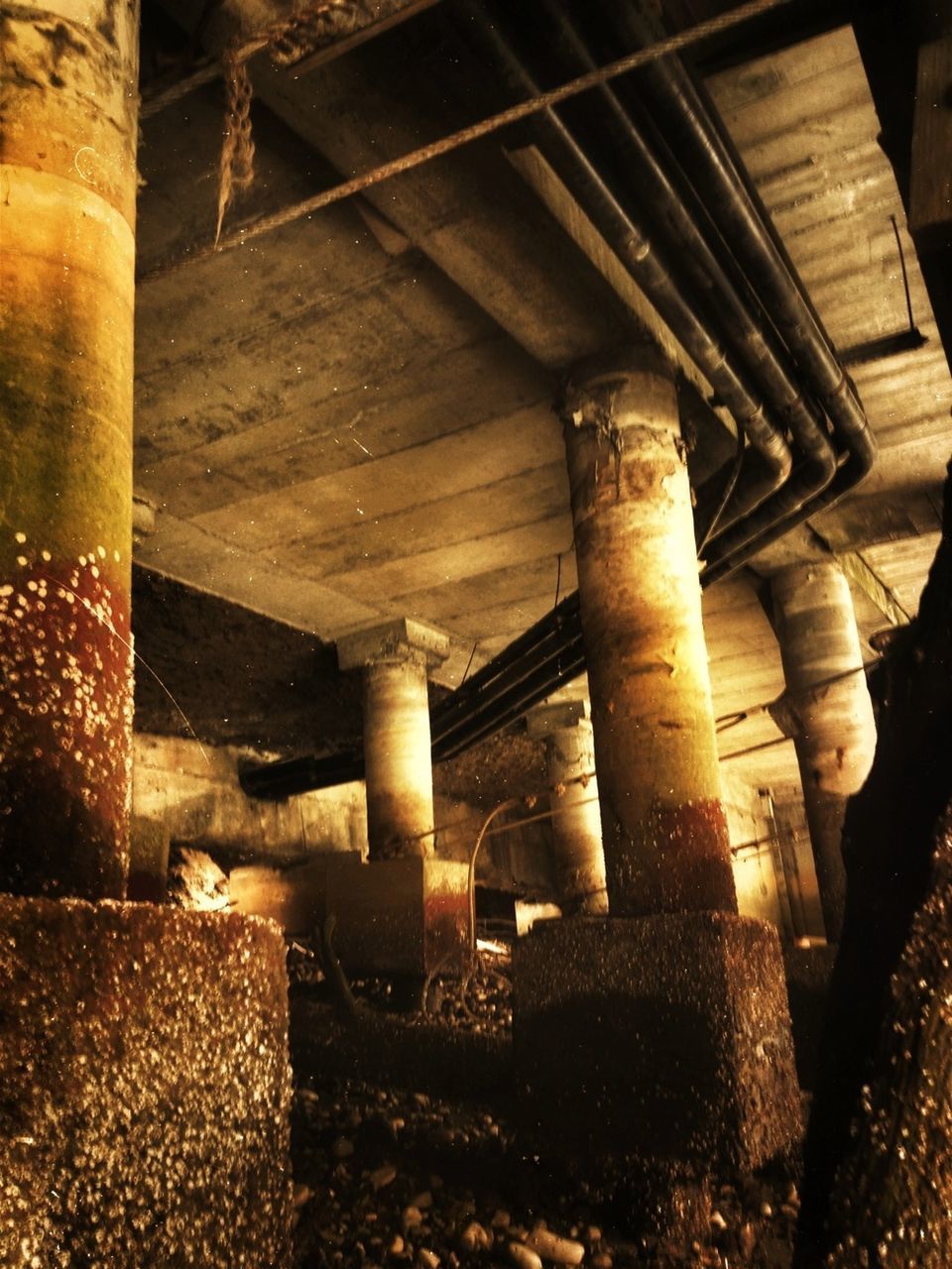 indoors, abandoned, built structure, architecture, old, architectural column, obsolete, run-down, damaged, deterioration, interior, column, ruined, old ruin, weathered, sunlight, low angle view, metal, bad condition, rusty