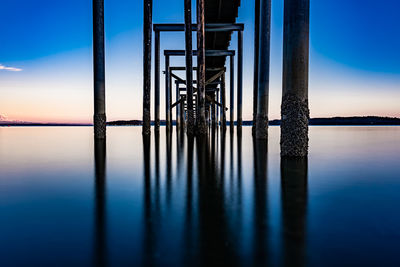 Scenic view of sea against sky at sunset