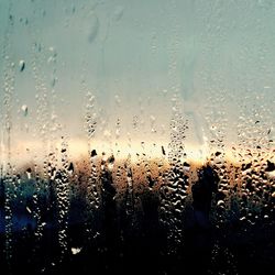 Close-up of water drops on glass