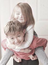 Playful siblings at home