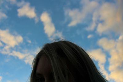 High section of built structure against cloudy sky