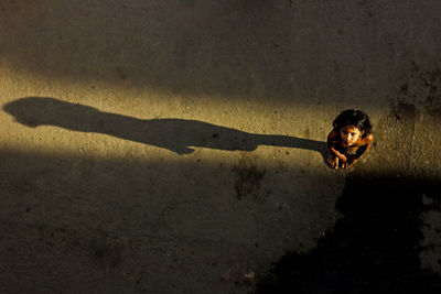 High angle view of shadow on wall