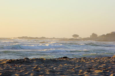 Scenic view of sea against clear sky