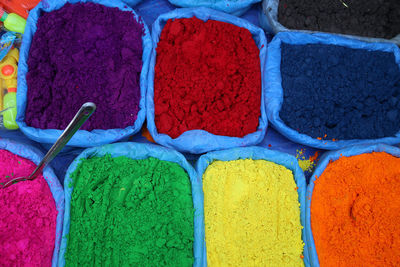 High angle view of various powder paints at market