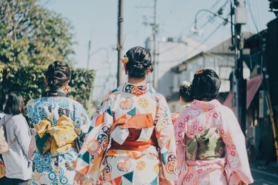 Rear view of people at temple