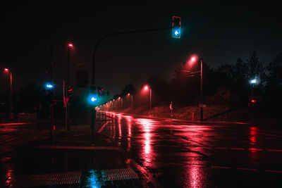 Illuminated street lights at night