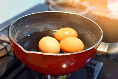 High angle view of eggs in container