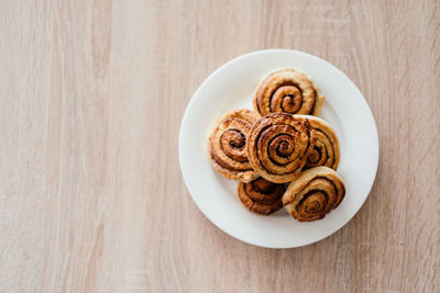 High angle view of cookies in plate on table