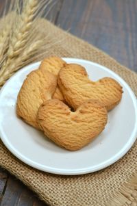 Heart shaped cookies in the white plate 