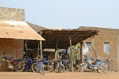 Bicycles parked against clear sky