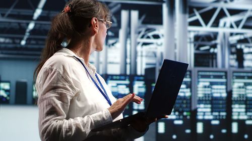 Businesswoman using mobile phone