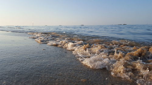 Scenic view of sea against clear sky