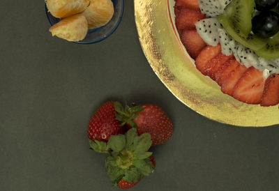 High angle view of fruits in plate on table