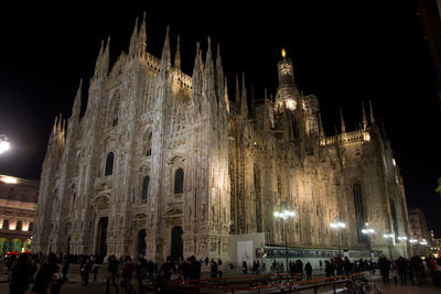 Tourists at night