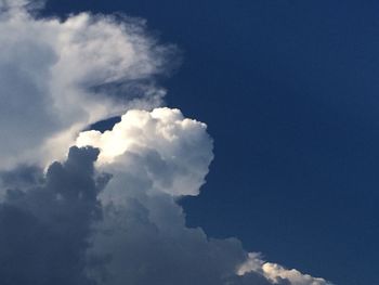 Low angle view of clouds in blue sky