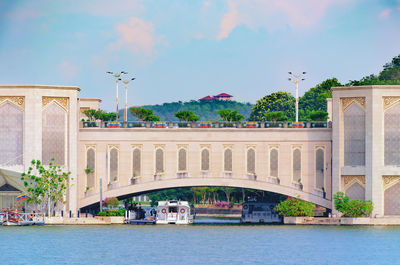 View of bridge over river in city