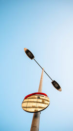 Low angle view of street light against clear sky