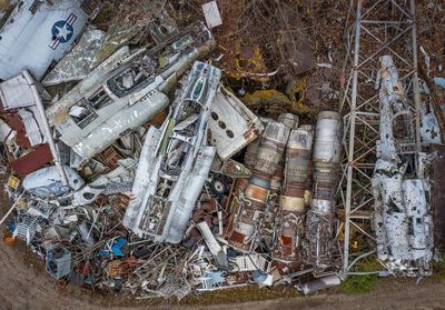 High angle view of garbage by metal structure