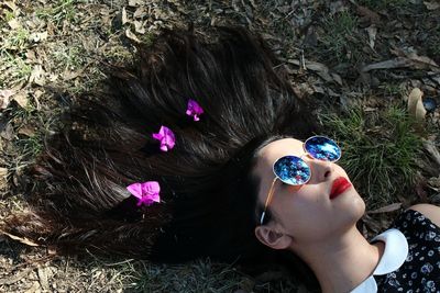 High angle view of woman with flowers