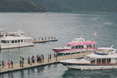 High angle view of people on sea