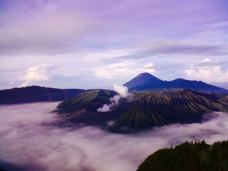 mountain, tranquil scene, scenics, tranquility, sky, mountain range, beauty in nature, cloud - sky, nature, landscape, cloudy, cloud, idyllic, non-urban scene, weather, physical geography, majestic, remote, outdoors, no people