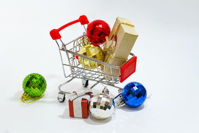 Close-up of red toy against white background